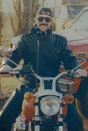 James T. “Tom” Scott